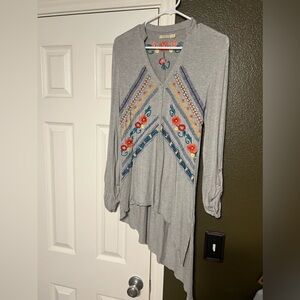 Asymmetrical grey jersey knit top. Brand is Caite! Size small